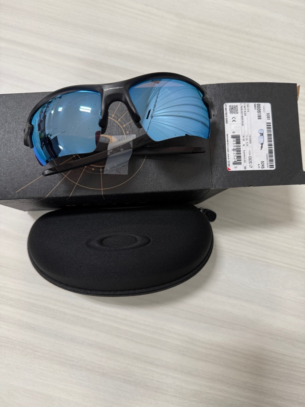 Oakley oo9188 flak 2.0XL Black Frame Sunglasses with Blue Mirrored Lenses